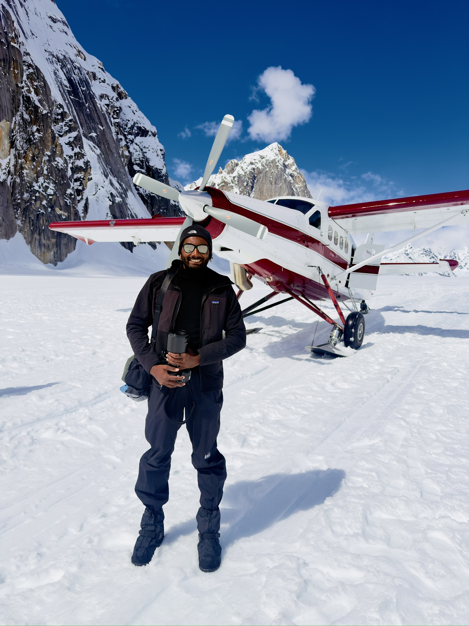 Bush plane on a glacier beneath Denali