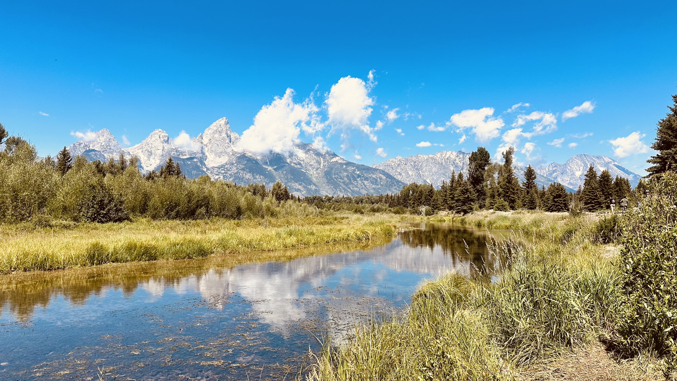 Grand Tetons with river reflection